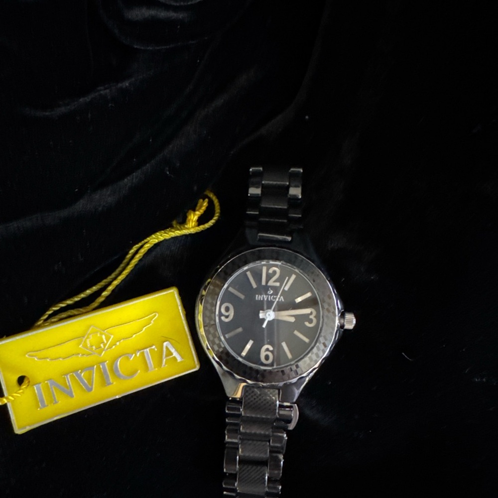 Invicta Silver and Black Timepiece